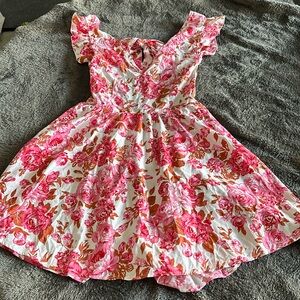 NWT dress with tie back closure and open back. Size L